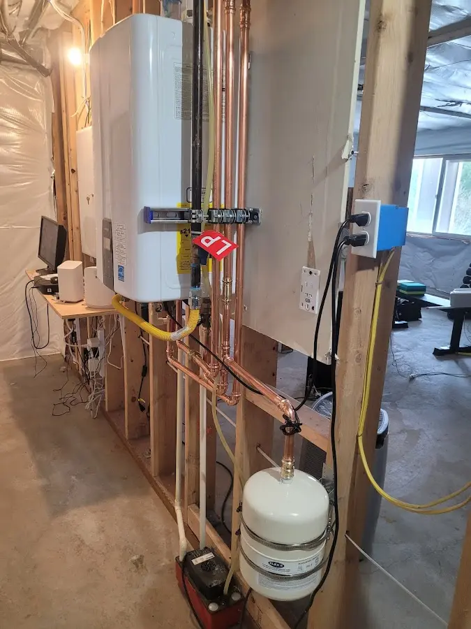 Licensed plumber repairing a kitchen sink in Frankfort